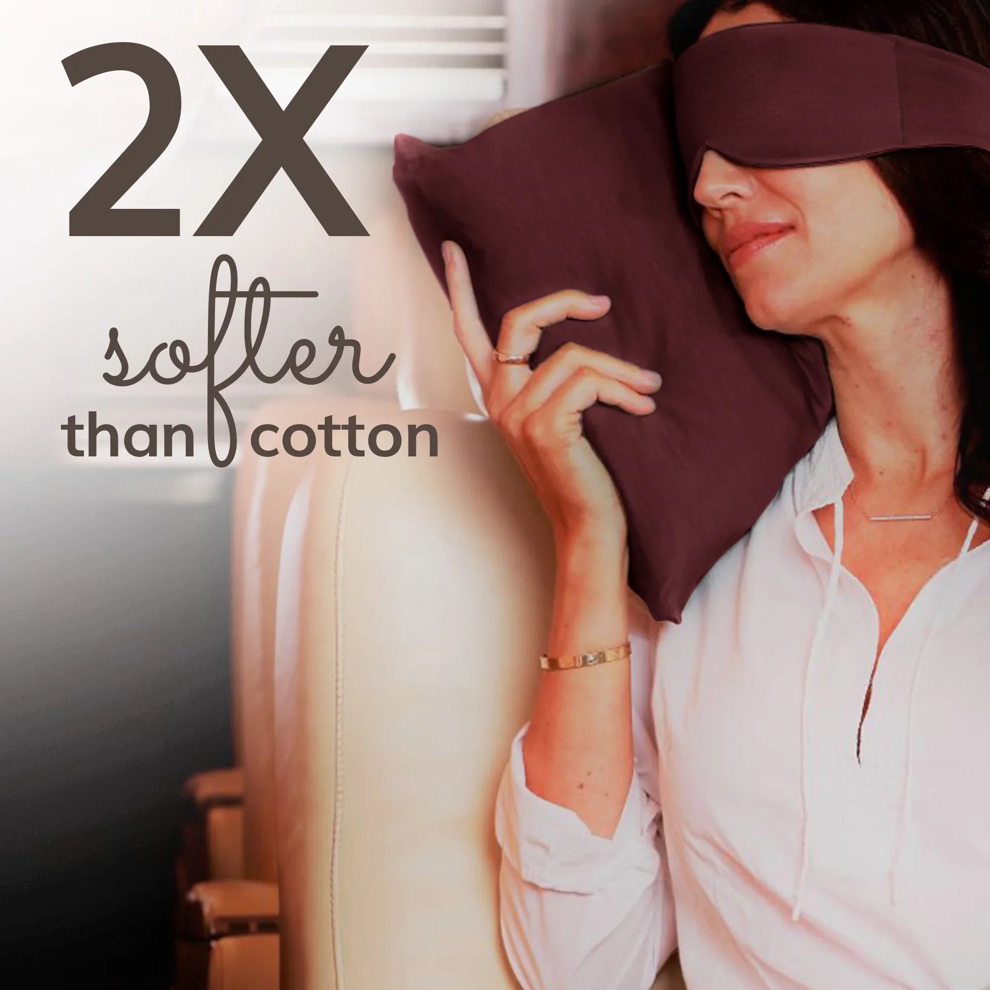 Woman sleeping with soft travel eye mask and pillow, 2x softer than cotton for luxury comfort