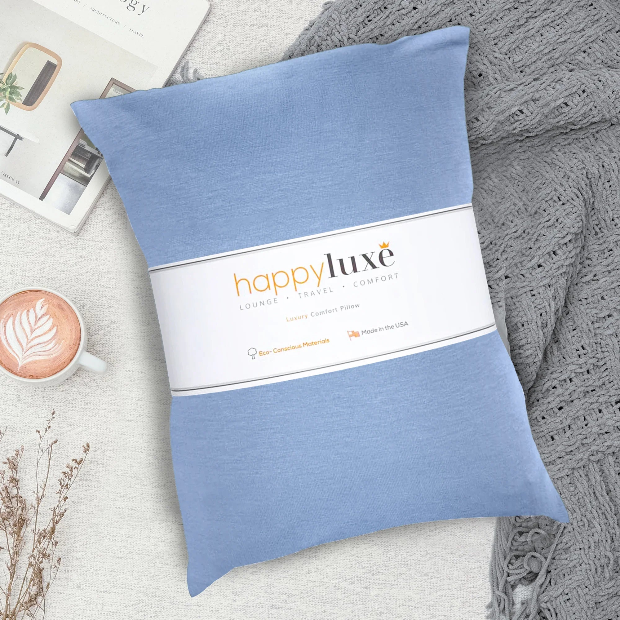Soft blue luxury comfort pillow with eco-conscious materials, perfect for travel and home relaxation