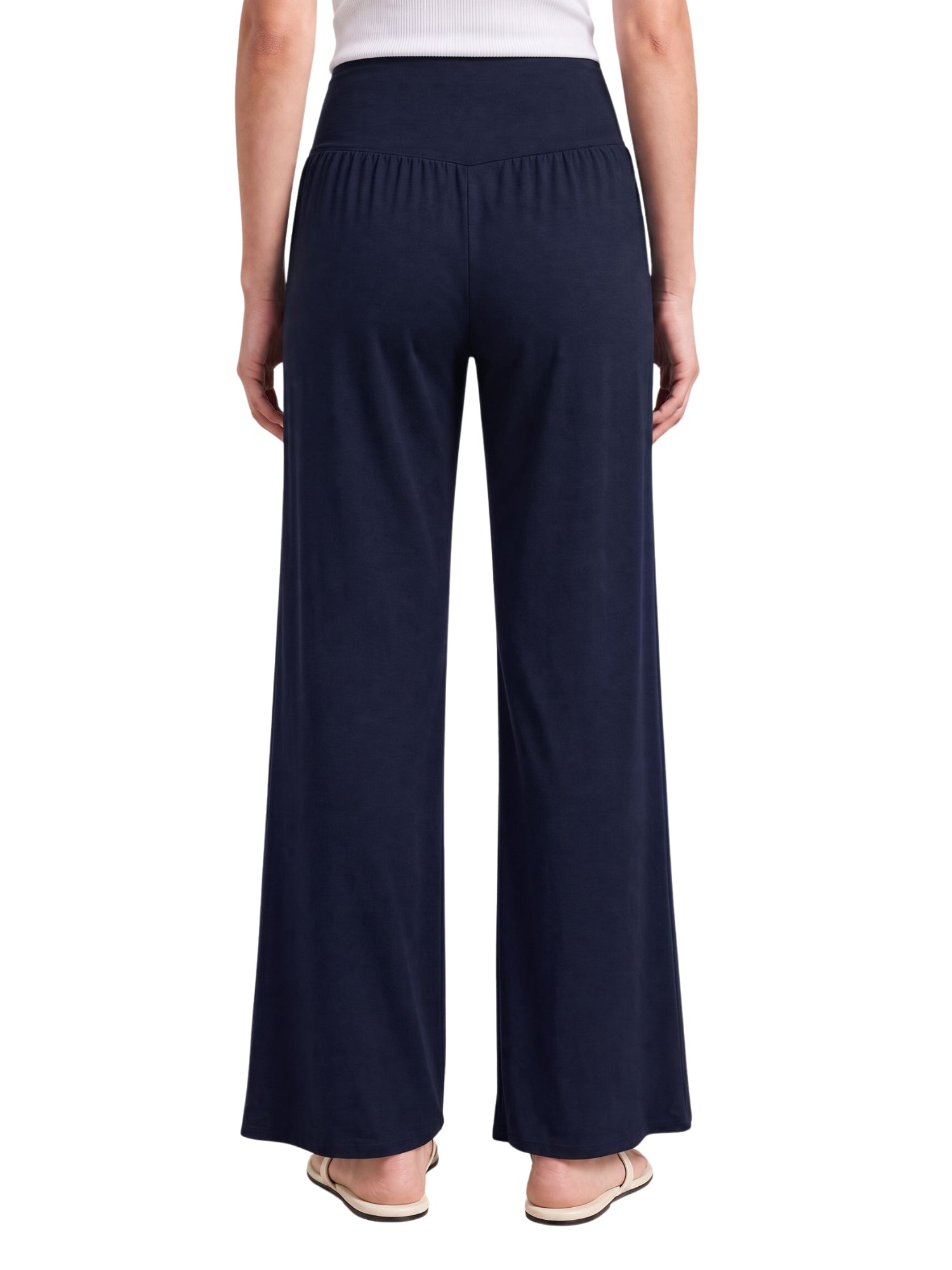 Navy wide-leg travel pants with elastic waist, soft sustainable fabric for comfort on flights or at home